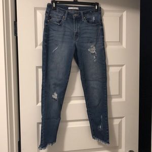 Capri jeans with angled cut